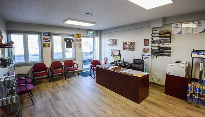 Front desk and waiting area inside Motor Bay Auto Repair